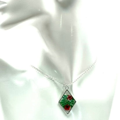 Green & red pendant with pressed flowers