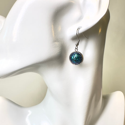 Green dot dangle earrings